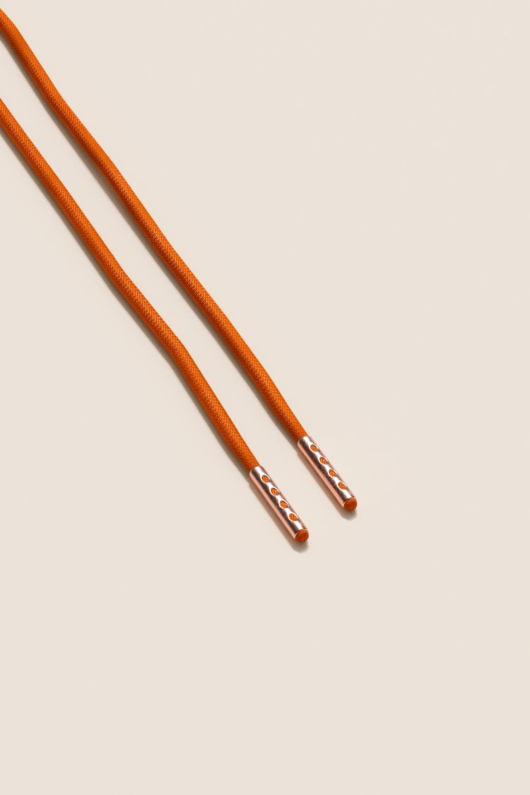 Senkels Orange 2.5mm Round Waxed Shoelaces with Rose Gold Aglets